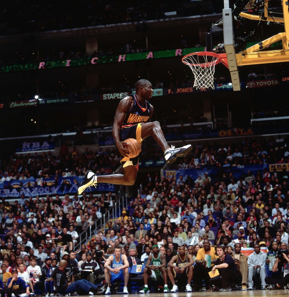 LOS ANGELES - FEBRUARY 14:  Jason Richardson #23 of the Golden State Warriors goes for a dunk during the Sprite Rising Stars Slam Dunk Competition on February 14, 2004 at the Staples Center in Los Angeles, California.   NOTE TO USER: User expressly acknowledges and agrees that, by downloading and or using this photograph, User is consenting to the terms and conditions of the Getty Images License Agreement. (Photo by Andrew D. Bernstein/NBAE via Getty Images)
